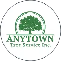 Anytown Tree Service logo featuring pine trees inside a saw blade.